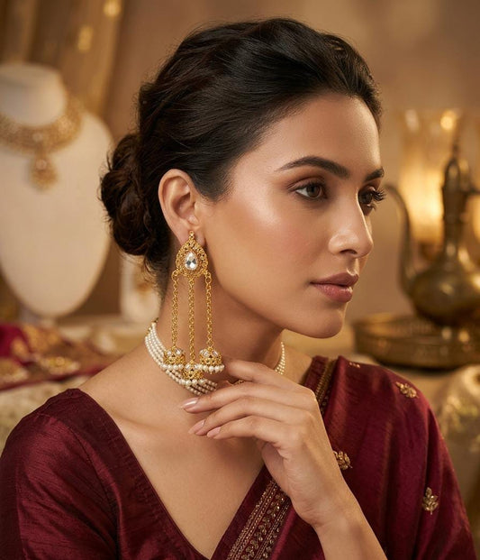 Traditional Gold Jhumka Earrings with Pearls