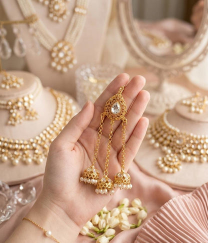 Traditional Gold Jhumka Earrings with Pearls